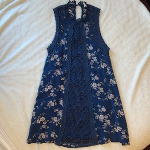 Navy blue midi dress, with lace detailing from Entro in the size small.